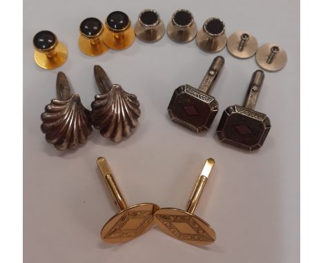 Christian Dior- A pair of vintage CD engraved silver tone cufflinks together with a pair of 9ct gold engraved oval shaped cuf