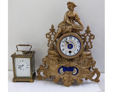 A late 19th century French gilt metal mantle clock 31cmH x 24cmW, together with a brass cased carriage clock Location:If ther