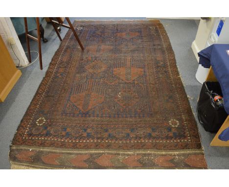 An old Persian rug, 276cm x 170cm.