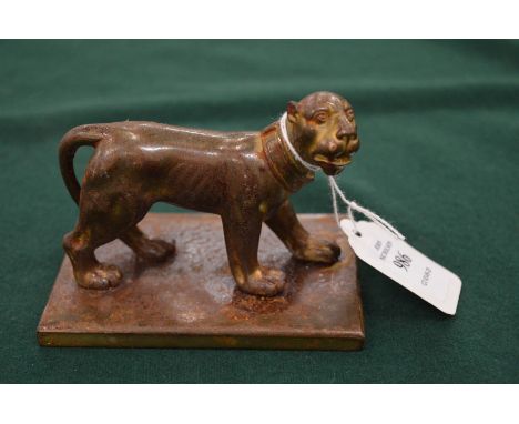 Cast metal paperweight modelled as a lion.
