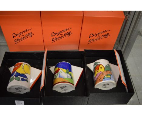 Three Wedgwood Clarice Cliff collection Bizarre conical milk jugs, all boxed.