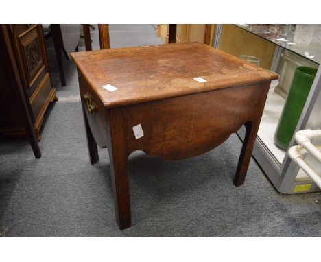 A 19th century mahogany commode.