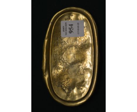 An old brass tobacco box.