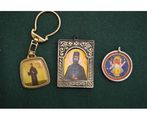 Three silver Russian key rings.