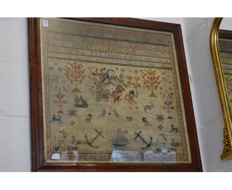 A Victorian framed and glazed sampler.
