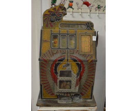 A Mills Company 'War Eagle' one armed bandit/slot machine circa 1930-1940, tired but in working order.