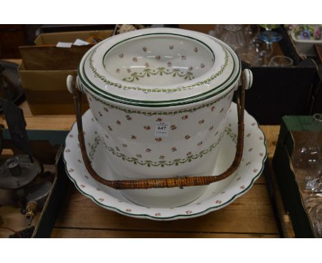 A George Jones floral decorated porcelain slop bucket and matching wash bowl.