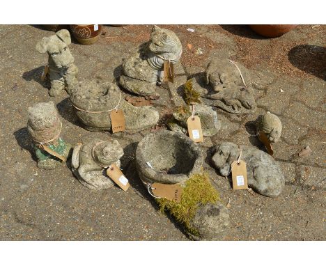 A collection of reconstituted stone garden ornaments modelled as animals etc.