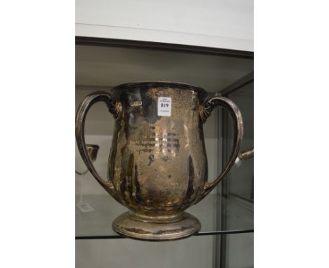A large silver tyg shaped trophy cup.