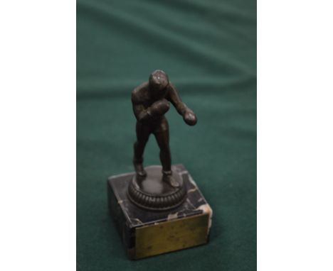 A small bronze boxing trophy on marble base.