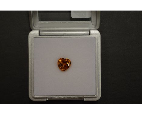 A heart shaped citrine, boxed with certificate.