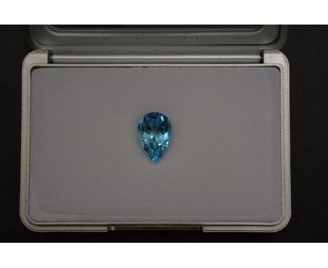 A pear shaped blue topaz, boxed with certificate.