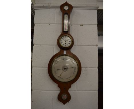 A combination mahogany cased barometer, thermometer and clock.