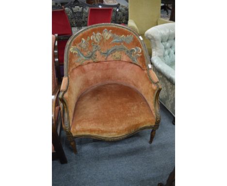 A large beech framed French fauteuil.