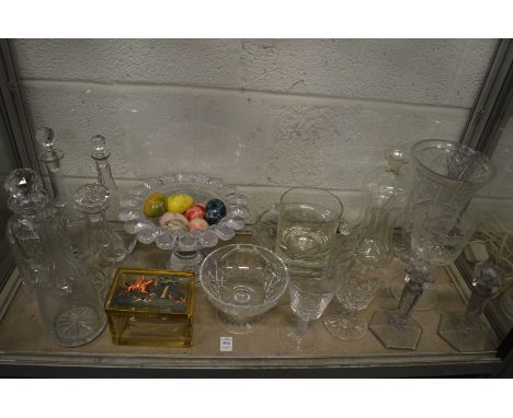 A collection of glassware to include a casket enamelled  with a hunting scene and a large engraved goblet etc.