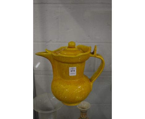 A yellow glazed Chinese lidded ewer.