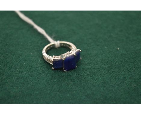 14ct white gold, diamond and sapphire ring.