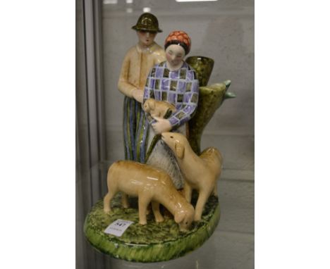 A Lenci porcelain figure group of a shepherd, shepherdess and sheep, signed to the base Lenci, made in Italy 5-5-31.