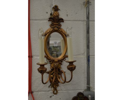 A decorative girandole.