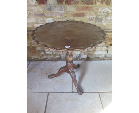 A mahogany tilt top side table with a birdcage action on a carved tripod base. 70 cm tall x 70 cm diameter. Removed from a Ca