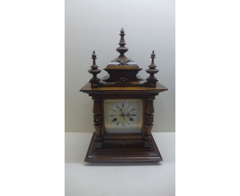 A 19th century Jonhams mantle clock 8-day movement strikes on gong. 47cmk tall, running in saleroom. 