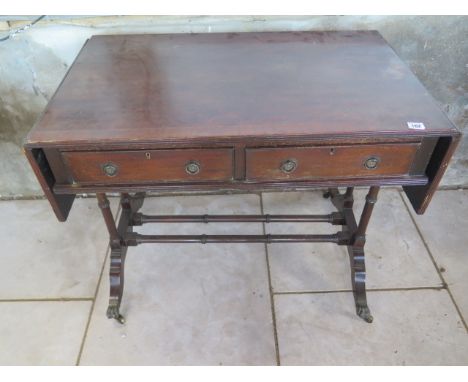 A Georgian style mahogany drop leaf sofa table. 73cm tall x 137cm extended x 56 cm. Removed from a Cambridge property, owned 