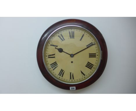 A 12 inch dial; spring drive wallclock, mahogany surround chrome bezel - running 