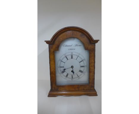 A walnut mantle clock with a chain driven fusee movement and silvered dial signed Edmund Martin London, 27cm tall, in general