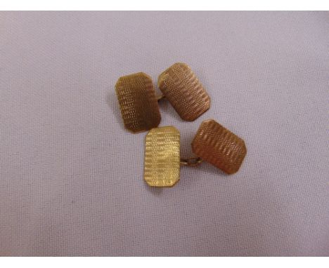A pair of 9ct yellow gold engine turned cufflinks, approx total weight 3.1g