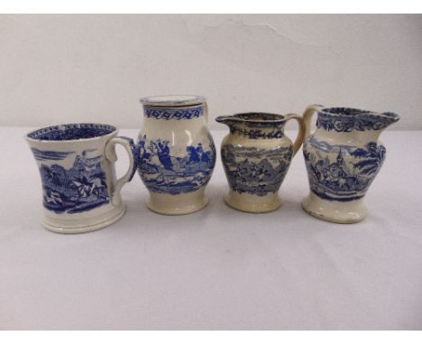 A quantity of blue and white porcelain depicting hunting scenes to include two jugs and two tankards
