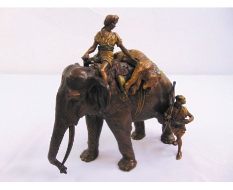 A cold painted bronze figural group, in the style of Bergman