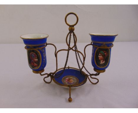 A continental gilt metal and porcelain table centre piece comprising a bowl and two vases decorated with portrait miniatures 
