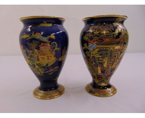 A pair of Carltonware Chinoiserie pattern baluster vases with everted rims and raised circular bases, marks to the base