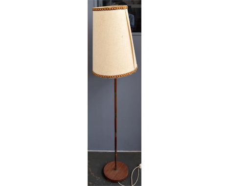 A mid-century standard lamp with 1970s shade