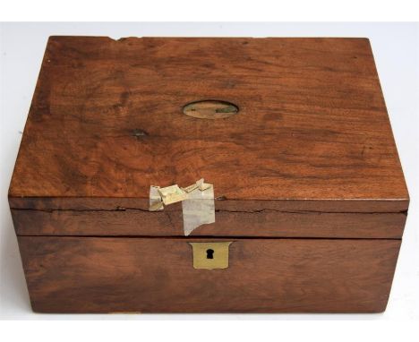 A small walnut box containing gilding tools and a letter addressed to Mr Spiers from the Deputy Surveyor of the Queens Pictur