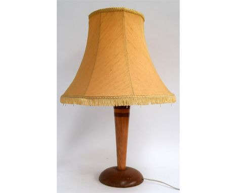 A mid-century table lamp and a turned wood standard lamp on circular base
