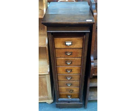 A tabour fronted set of eight drawers raised on ceramic casters 37cmx50x120cmH