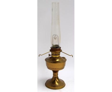 A brass oil lamp with glass chimney, 'Aladdin No.23', made in England, 60cmH