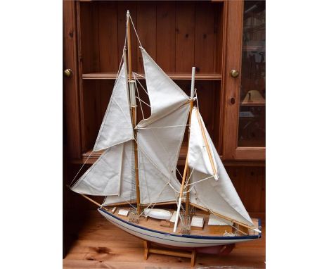 A model of a wooden boat, bears the name 'Hannah', LOA 65cmL