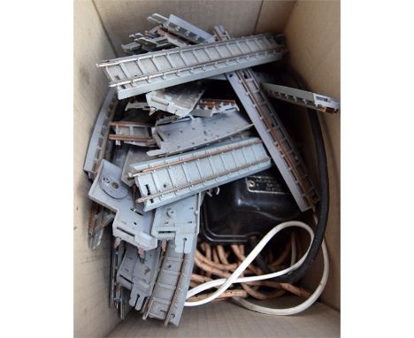 A quantity of vintage model railway track and related items