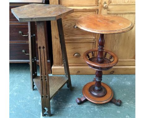 A small walnut topped lamp table an baluster turned support and scrolling feet, having turned undershelf with spindle turned 