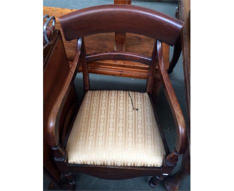 A Victorian commode chair with ceramic chamber pot and lid, together with an embroidered fire screen, ceramic umbrella stand,