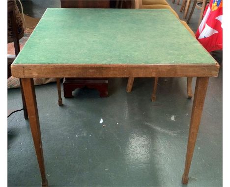 A small folding card table with green baize top, the square tapering oak legs locking into place when open, 76.5cm square, 68