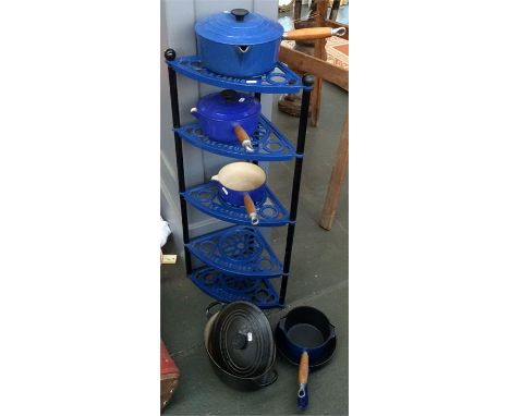 A quantity of Le Cruset pots and pans with Le Cruset four shelf corner pot stand