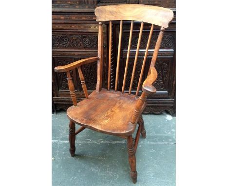 An elm stick back chair on double H stretcher