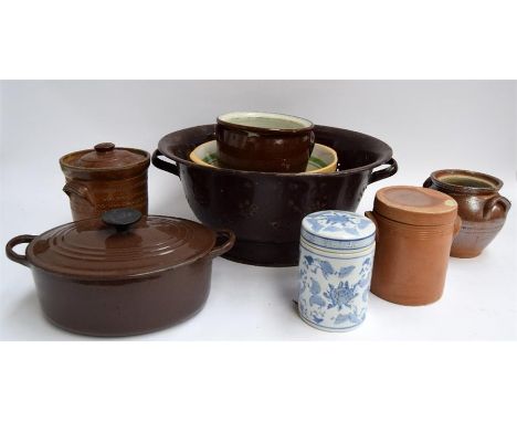 A lot of glazed stoneware cooking jars, a mixing bowl, and a Le Cruset casserole dish, together with a very large enamel cola