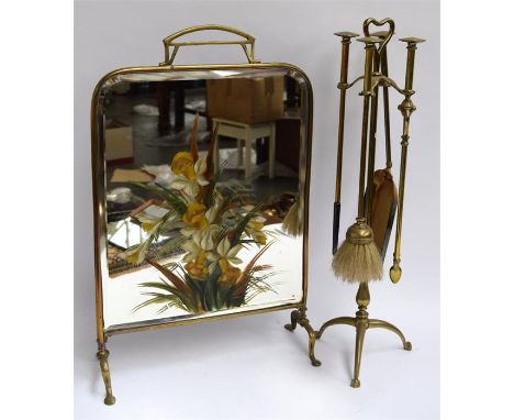 A set of brass fire tools along with a brass and bevelled mirror fire screen