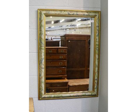 A Georgian fretwork mirror (a.f.), a modern painted and parcel-gilt mirror, a black painted metal fireguard and a further mah