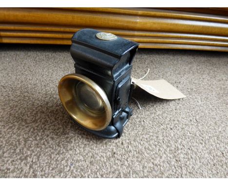 An early 20th Lucas bicycle lamp. 