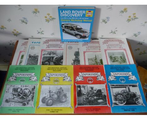 Tractor magazines and a landrover discovery manual. 
